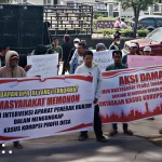 Hundreds rally in Karo, urge prosecutors to pursue village fund corruption case