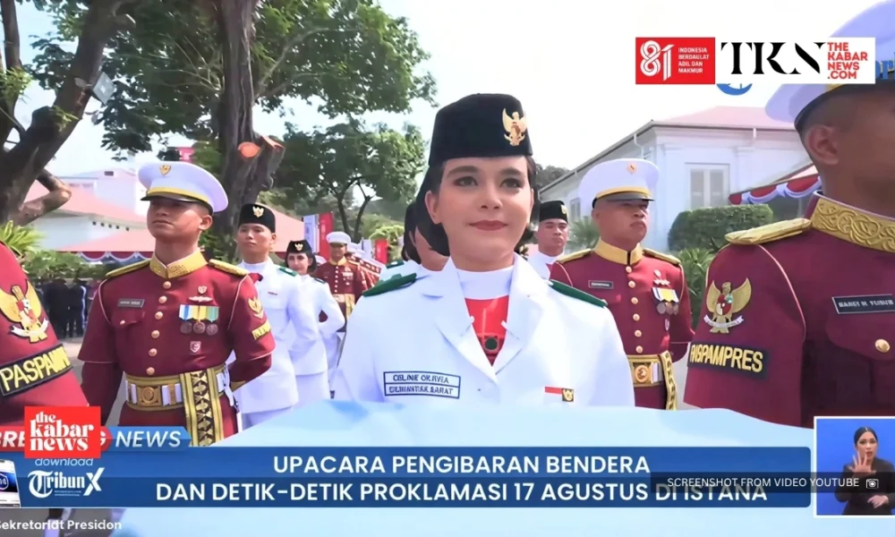 Celine Olivia carries flag tray at Merdeka Palace | The Kabar News